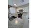 Updated kitchen with white cabinets, granite countertops, and stainless steel oven; microwave coming soon at 97 N Cooper Rd # 97, Chandler, AZ 85225