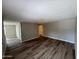 Spacious living room with modern floors and neutral paint, offering a clean and bright space at 97 N Cooper Rd # 97, Chandler, AZ 85225