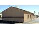 Side building exterior on a large, paved parking lot ready for parking at 9913 E Main St # 40, Mesa, AZ 85207