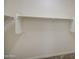 A view of the interior of a walk-in closet with a hanging rod at 10430 E Sunflower Ln, Florence, AZ 85132