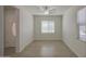 Spacious and bright living room with tile flooring and ample natural light at 10430 E Sunflower Ln, Florence, AZ 85132