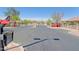 A gated community entrance with well manicured landscaping at 1125 E Milada Dr, Phoenix, AZ 85042