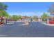 A gated community entrance with well manicured landscaping at 1125 E Milada Dr, Phoenix, AZ 85042