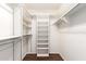 Spacious walk-in closet features built-in shelving and ample storage space at 11510 E Lomita Ave, Mesa, AZ 85209