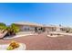 Lovely single-story home with desert landscaping and a charming front exterior at 11510 E Lomita Ave, Mesa, AZ 85209