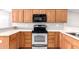 Beautiful kitchen featuring oak cabinets and stainless steel oven at 11510 E Lomita Ave, Mesa, AZ 85209
