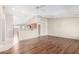 Spacious living area with vaulted ceiling that connects to the bright kitchen at 11510 E Lomita Ave, Mesa, AZ 85209