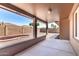 Covered patio with open view to a desert landscaped backyard, perfect for outdoor enjoyment at 11510 E Lomita Ave, Mesa, AZ 85209
