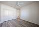 A cozy bedroom features a closet for storage and warm-toned flooring at 12679 W Lowden Rd, Peoria, AZ 85383