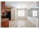 Inviting dining area with bright natural light, seamlessly connecting to the adjacent kitchen at 12679 W Lowden Rd, Peoria, AZ 85383