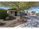 This home has a desert-friendly yard with mature shade trees and a 2-car garage at 12679 W Lowden Rd, Peoria, AZ 85383