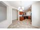 Eat-in kitchen featuring tile floors, ample wood cabinets, and black appliances at 12679 W Lowden Rd, Peoria, AZ 85383