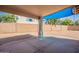 Covered backyard patio with extended gravel area, providing a great outdoor space at 1343 W Roadrunner Dr, Chandler, AZ 85286