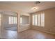 Open dining space with tiled floors, plantation shutters and natural light at 1343 W Roadrunner Dr, Chandler, AZ 85286