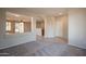 Open living space flows seamlessly into the kitchen and dining area, great for entertaining at 1343 W Roadrunner Dr, Chandler, AZ 85286
