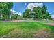 Expansive park with playground and mature trees at 1343 W Roadrunner Dr, Chandler, AZ 85286