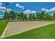 Sand volleyball court with manicured lawn at 1343 W Roadrunner Dr, Chandler, AZ 85286