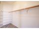 Walk-in closet with built-in shelving and a hanging rod for ample storage at 1343 W Roadrunner Dr, Chandler, AZ 85286