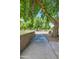 Walking path through a park with mature shade trees at 1343 W Roadrunner Dr, Chandler, AZ 85286