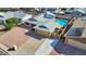 Aerial view of a home featuring a backyard pool with patio, and a two car garage at 1511 W Mesquite St, Chandler, AZ 85224