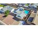 Aerial view of a home featuring a backyard pool with patio, and a two car garage at 1511 W Mesquite St, Chandler, AZ 85224