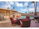 Outdoor patio area featuring comfortable seating, perfect for entertaining and relaxing by the pool at 1511 W Mesquite St, Chandler, AZ 85224