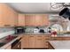 Bright kitchen with lots of cabinets and stainless steel appliances and sink at 1602 N 73Rd Ave, Phoenix, AZ 85035
