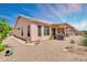 Backyard view highlighting a covered patio and privacy fencing at 1633 E Jasmine St, Casa Grande, AZ 85122