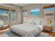 Serene bedroom featuring many windows that fill the room with lots of natural light at 1633 E Jasmine St, Casa Grande, AZ 85122