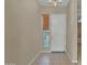 Inviting entryway featuring neutral walls, tiled floor, and a classic chandelier at 1633 E Jasmine St, Casa Grande, AZ 85122