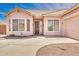 Charming single-story home with a well-maintained driveway and attached garage at 1633 E Jasmine St, Casa Grande, AZ 85122