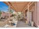 Covered patio with an outdoor dining area, ideal for enjoying meals and relaxing outside at 1633 E Jasmine St, Casa Grande, AZ 85122
