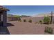 Private backyard with gravel landscape and view of neighboring homes at 16500 W Caldwell St, Goodyear, AZ 85338