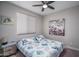 Cozy bedroom featuring a comfortable bed and soft lighting at 16500 W Caldwell St, Goodyear, AZ 85338