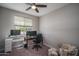 Functional office space with two desks and comfortable chair at 16500 W Caldwell St, Goodyear, AZ 85338