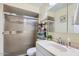 Bathroom with a shower featuring patterned glass at 1657 N 55Th Ave, Phoenix, AZ 85035