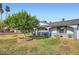 Inviting single-story home with well-maintained lawn, landscaping, and classic facade at 1657 N 55Th Ave, Phoenix, AZ 85035