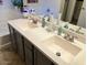 Bathroom featuring a dual sink vanity with modern fixtures and ample counter space at 171 W Hawaii Dr, Casa Grande, AZ 85122