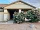 Charming single-story home with a well-maintained front yard and beautiful flowering bushes at 171 W Hawaii Dr, Casa Grande, AZ 85122