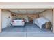 Spacious two-car garage providing ample storage and parking space with work and utility areas at 18116 N Catherine Dr, Surprise, AZ 85374
