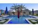 Backyard pool features desert landscaping, fire bowls, and water features for relaxing outdoor living at 18175 W Highland Ave, Goodyear, AZ 85395