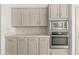 Well-equipped kitchen featuring marble countertops, stainless steel appliances, and ample cabinet space at 19550 N Grayhawk Dr # 1117, Scottsdale, AZ 85255