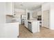 Spacious kitchen with modern appliances, center island, and ample counter space at 19550 N Grayhawk Dr # 1117, Scottsdale, AZ 85255