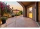 Covered patio with desert landscaping, flowers and cactus at 19550 N Grayhawk Dr # 1117, Scottsdale, AZ 85255