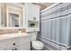 Bathroom featuring a vanity, mirror, and shower with striped curtain at 20626 N 5Th Ave, Phoenix, AZ 85027