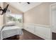 Bright bedroom with wainscoting, a large window, and laminate flooring at 20626 N 5Th Ave, Phoenix, AZ 85027