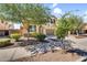 Charming two-story home with manicured landscaping and a welcoming entrance at 21031 E Creekside Dr, Queen Creek, AZ 85142