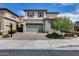 Elegant two-story home with a private driveway and a two-car garage at 214 W Beverly Ln, Phoenix, AZ 85023