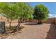 Desert-landscaped backyard offers privacy and space for outdoor enjoyment at 21621 N 48Th Pl, Phoenix, AZ 85054