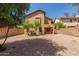 Spacious backyard features desert landscaping and a private perimeter wall at 21621 N 48Th Pl, Phoenix, AZ 85054